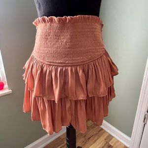 Skirt or Skort. Tan. Has built in shorts.
